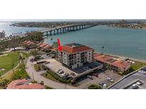 Stunning building offers waterfront living, convenient parking, and beautiful golf course views from many units at 6279 Sun Blvd # 605, St Petersburg, FL 33715