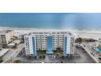 Aerial view of the Sea Breeze Condominiums in Madeira Beach with parking and beach access at 13500 Gulf Blvd # 505, Madeira Beach, FL 33708