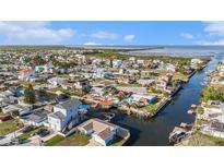 A beautiful waterfront neighborhood, with picturesque canals and private boat docks for easy water access at 13429 Lisa Dr, Hudson, FL 34667