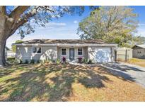 Charming single-story home featuring well-maintained landscaping and mature trees at 8899 53Rd N Way, Pinellas Park, FL 33782