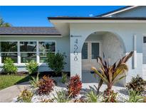 A well maintained house with a well maintained lawn and garden at 4568 40Th S St, St Petersburg, FL 33711