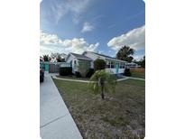 Charming single-story home with well-maintained lawn and inviting curb appeal at 1564 S Michigan Ave, Clearwater, FL 33756
