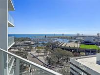 Expansive water view from balcony overlooking marina and stadium with stadium, ocean and buildings at 175 1St S St # 1204, St Petersburg, FL 33701
