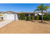 Charming single-story home with xeriscaped front yard and a well-maintained exterior at 5315 Swallow Dr, New Port Richey, FL 34652