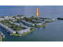 An aerial view of waterfront condos with boat docks near the water's edge at 5231 Beach Se Dr # A, St Petersburg, FL 33705