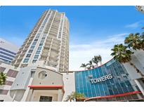 Exterior of The Towers featuring a modern architectural style and tropical landscaping at 449 S 12Th St # 2702, Tampa, FL 33602