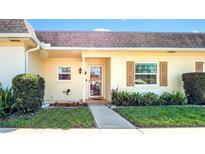 Charming home exterior with manicured lawn and a welcoming front entrance at 1662 S Lake Ave # 2, Clearwater, FL 33756