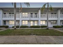 Charming two-story condo with well-manicured lawn and freshly painted exterior at 211 Brandy Wine Dr # 211, Largo, FL 33771