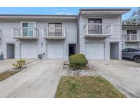 Charming townhome featuring private balconies and attached garages in a quiet neighborhood at 6311 93Rd N Ter # 4403, Pinellas Park, FL 33782