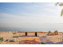 Bench overlooks the expansive waterfront and skyline in a serene and picturesque setting at 2158 Blossom S Way, St Petersburg, FL 33712