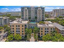 Stunning high-rise condo building with a rooftop pool, offering luxurious urban living and picturesque city views at 400 4Th S Ave # 704, St Petersburg, FL 33701