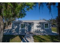 Charming single-story home with a well-maintained front yard and inviting entryway at 8901 N 20Th St, Tampa, FL 33604