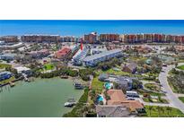 Coastal condo community with waterfront access and stunning views of the Gulf at 125 Shoals Cir, North Redington Beach, FL 33708