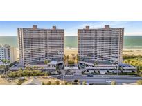 Panoramic view of the beachfront condo towers featuring amenities and beautiful ocean views at 1340 Gulf Blvd # 6E, Clearwater Beach, FL 33767