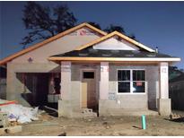Image of a building under construction with visible roof framing and concrete block walls at 8111 N Edison Ave, Tampa, FL 33610