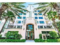 Elegant building exterior showcasing well-maintained landscaping and a welcoming entrance at 146 4Th Ne Ave # 204, St Petersburg, FL 33701