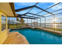 Screened-in pool and spa with lovely intercoastal views make for resort style living at 8841 W Millpoint Rd, Riverview, FL 33578
