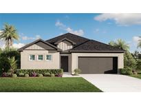 Charming single-story home featuring a two-car garage, well-maintained lawn, and neutral color palette at 1188 Bartlett Ave, North Port, FL 34288