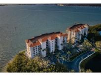 Stunning aerial view of bayfront condos with beautiful landscaping and gorgeous waterfront views at 4830 Osprey S Dr # 305, St Petersburg, FL 33711