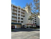 Multi-story condo building with a well-maintained exterior and convenient parking at 6425 Shoreline Dr # 10506, St Petersburg, FL 33708