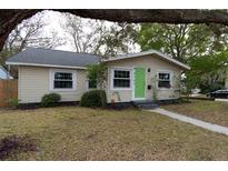 Charming one-story home with a well-maintained front yard and inviting green front door at 4162 3Rd N Ave, St Petersburg, FL 33713