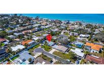 Charming coastal home near the ocean with lush landscaping in a desirable neighborhood at 920 Spruce Dr, Belleair Beach, FL 33786