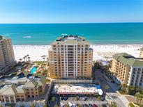 Expansive view of beachfront condo with private beach access and resort-style amenities at 11 Baymont St # 1403, Clearwater Beach, FL 33767