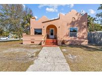 Charming single-story home featuring unique architectural details and a welcoming entryway at 1900 17Th S St, St Petersburg, FL 33712