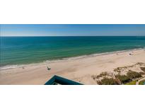 Beautiful beach with blue water, soft sand, and peaceful scenery offers a tranquil coastal escape at 1560 Gulf Blvd # 1104, Clearwater Beach, FL 33767