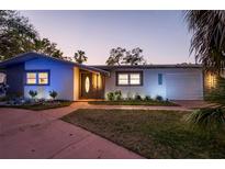 Charming single-story home with well-manicured lawn and inviting front entrance at 1772 Indian Rocks S Rd, Largo, FL 33774