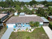 Charming single-story home featuring a well-maintained lawn and a inviting front porch at 2915 67Th Way N, St Petersburg, FL 33710