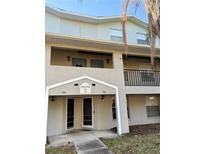 Inviting condo exterior with well-kept landscaping and classic architectural details at 7138 E Bank Dr # 7138, Tampa, FL 33617