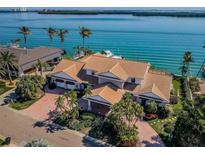Stunning waterfront property with lush landscaping, private dock and panoramic bay views from above at 4998 62Nd S Ave, St Petersburg, FL 33715