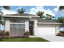Modern home featuring sleek lines, stone accents, a gray roof, and lush landscaping, providing curb appeal at 413 Sun Chaser Dr, Nokomis, FL 34275