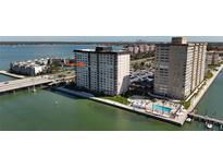 Waterfront condos featuring a community pool, docks, and convenient parking near the beach at 5220 Brittany S Dr # 1108, St Petersburg, FL 33715