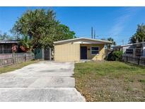 Charming single-story home featuring a concrete driveway and well-maintained yard at 3235 6Th S Ave, St Petersburg, FL 33701