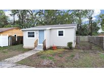 Charming single-story home features a newly updated exterior and stone walkway at 5630 55Th N St, St Petersburg, FL 33709