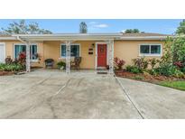 Charming single-story home featuring a welcoming porch and well-maintained landscaping at 4322 22Nd N Ave, St Petersburg, FL 33713
