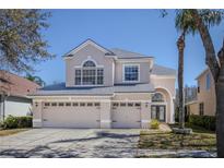 Charming two-story home with a three car garage and manicured landscaping at 17923 Timber View St, Tampa, FL 33647