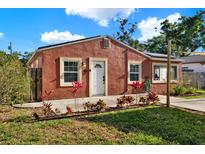 Charming single-story home with colorful landscaping and a quaint, inviting facade on a sunny day at 5613 19Th S Ave, Gulfport, FL 33707