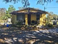 Charming single-Gathering home with mature trees and a welcoming front porch at 4905 Horton Rd, Plant City, FL 33567