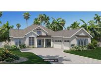 Charming single-story home featuring a paved driveway and lush tropical landscaping at 5837 Creek Ridge Rd, Brooksville, FL 34601