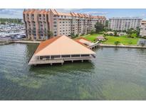 Stunning waterfront condo complex with unique on-the-water lounge, docks, and well-maintained grounds at 634 Edgewater Dr # 744, Dunedin, FL 34698