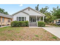 Charming single-Gathering home with a well-maintained lawn and inviting front porch at 1515 14Th S St, St Petersburg, FL 33705