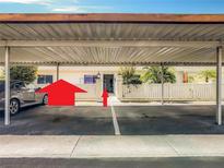 A view of the covered parking with access to the front door at 1655 S Highland Ave # G164, Clearwater, FL 33756