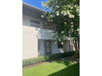 Charming condo featuring a balcony and lush landscaping at 1601 43Rd N St # 226, St Petersburg, FL 33713