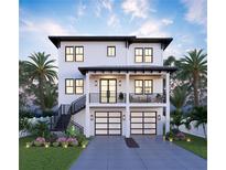 Two-story home with a two-car garage, balcony, front yard with landscaping, and a charming staircase on the left side at 2519 N Riverside Dr, Tampa, FL 33602