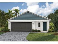 Charming single story home featuring clean stucco, stone driveway, and inviting dark front door at 37233 Sagemoor Dr, Zephyrhills, FL 33541