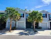 Charming townhome with a private garage, well-kept landscaping, and welcoming curb appeal at 3267 Pleasant Willow Ct, Brandon, FL 33511