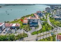 Enjoy an aerial view of the complex, landscaping, and waterfront views at 6357 Bahia Del Mar Blvd # 206, St Petersburg, FL 33715